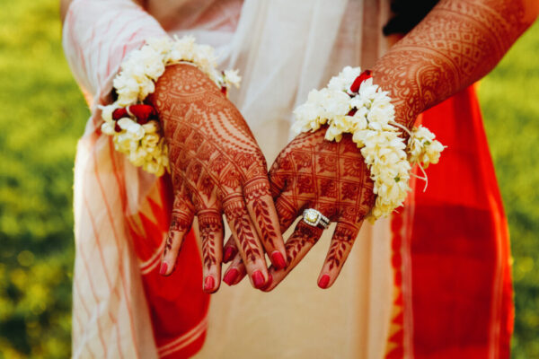 hindu-bride-shows-her-hands-covered-with-henna-tattoos